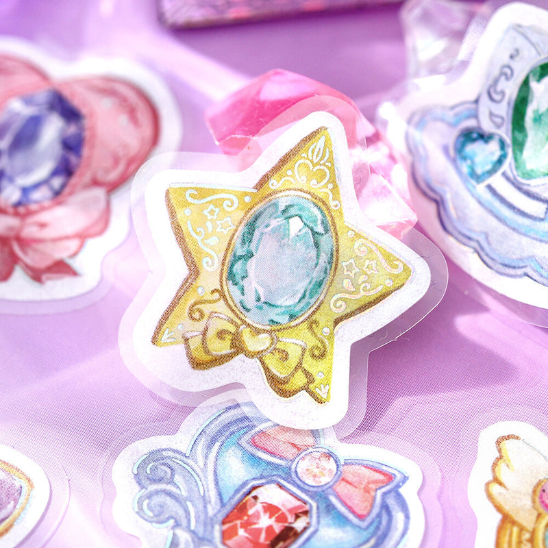 Decorative stickers with star and gem design on a purple background
