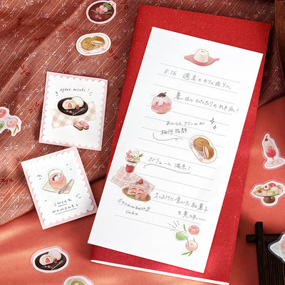 Menu with dessert illustrations on a red surface