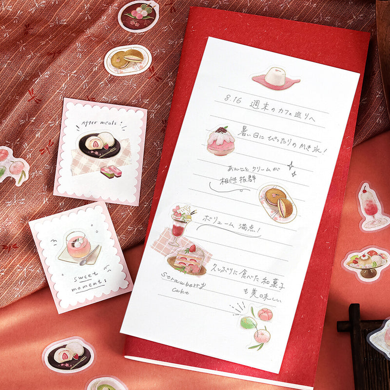 Menu with dessert illustrations on a red surface