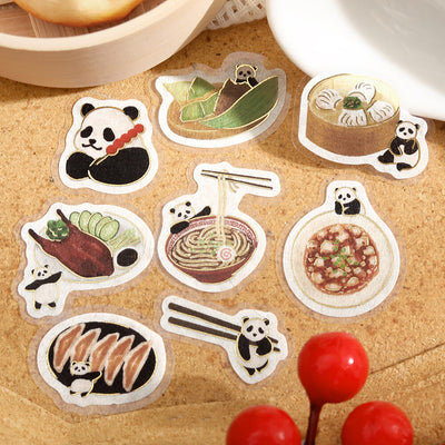 Set of decorative stickers featuring pandas and food items on a textured surface.
