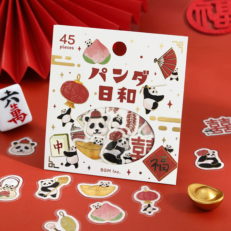 Packaging of panda-themed stickers with panda illustrations on a red background