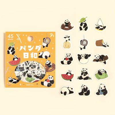 Set of panda-themed stickers with packaging on a beige background