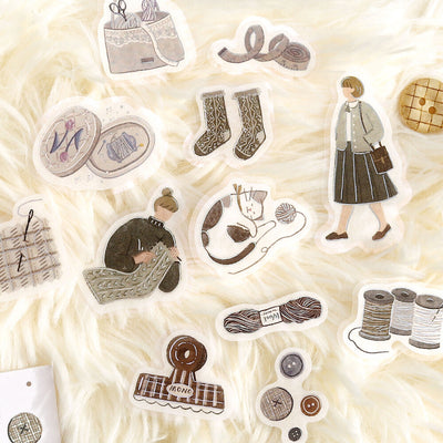 Set of illustrated stickers on a textured beige background