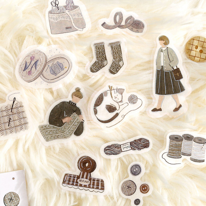 Set of illustrated stickers on a textured beige background