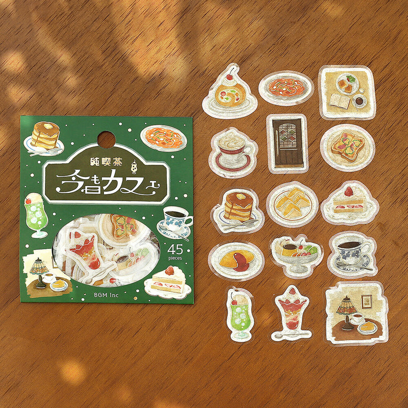 Sticker set with food illustrations on a wooden surface