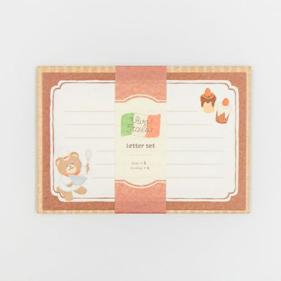 Letter set with a teddy bear design on a white background