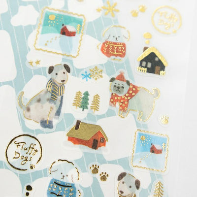 Collection of decorative stickers featuring dogs and winter elements on a light blue background.
