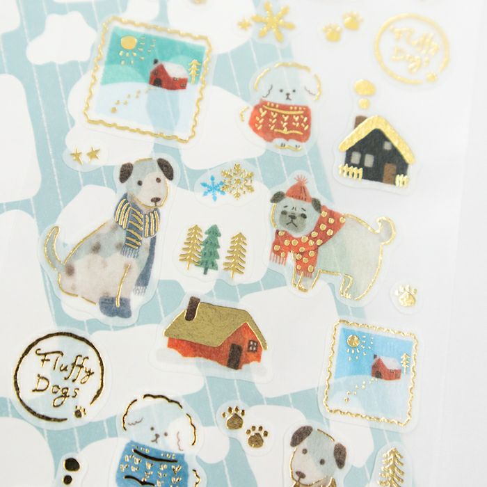Collection of decorative stickers featuring dogs and winter elements on a light blue background.