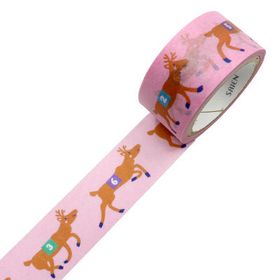 Decorative tape with reindeer design on a pink background